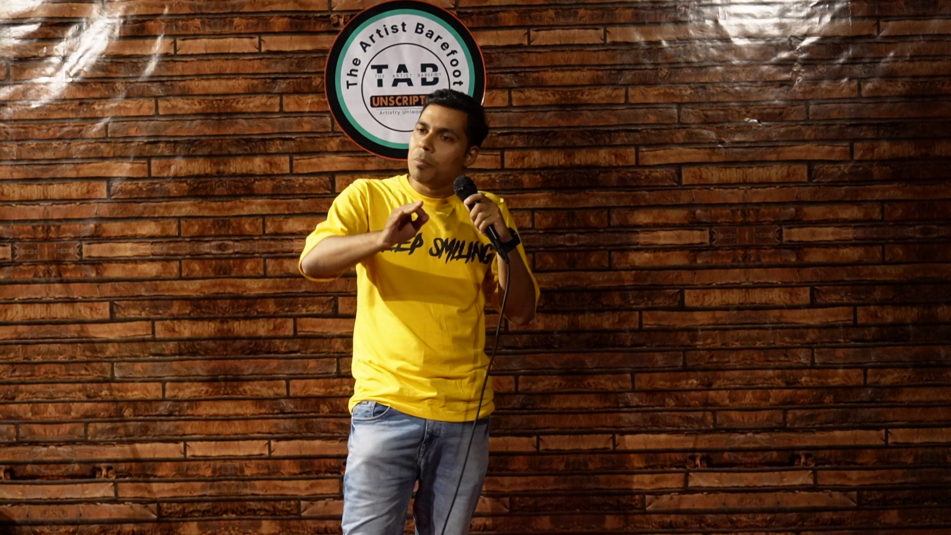 A poet reciting verses to an engaged audience